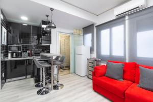 Kuchyň nebo kuchyňský kout v ubytování Argüelles Apartment