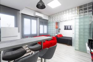TV a/nebo společenská místnost v ubytování Argüelles Apartment