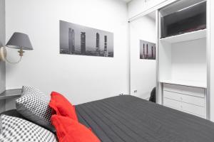 Postel nebo postele na pokoji v ubytování Argüelles Apartment