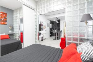 Postel nebo postele na pokoji v ubytování Argüelles Apartment