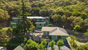 an aerial view of a house in the forest at Terrazas de Cruz Chica. in La Cumbre