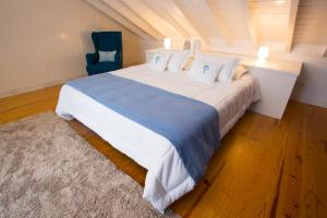Postel nebo postele na pokoji v ubytování T2 Lux Casa das Pereiras