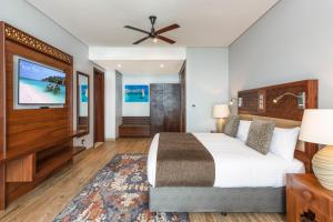 Кровать или кровати в номере Hotel Verde Zanzibar - Azam Luxury Resort and Spa - Dry Hotel