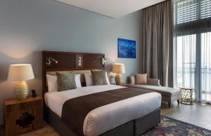 Кровать или кровати в номере Hotel Verde Zanzibar - Azam Luxury Resort and Spa - Dry Hotel