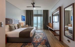 Кровать или кровати в номере Hotel Verde Zanzibar - Azam Luxury Resort and Spa - Dry Hotel