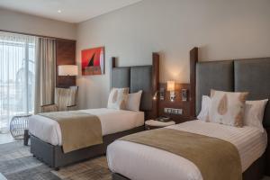 Кровать или кровати в номере Hotel Verde Zanzibar - Azam Luxury Resort and Spa - Dry Hotel