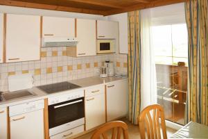 Kuchyň nebo kuchyňský kout v ubytování Ferienhaus Steger Maria