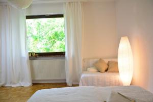 Postel nebo postele na pokoji v ubytování Haus mit Garten