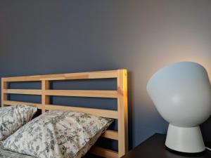 Posteľ alebo postele v izbe v ubytovaní Apartament GRUBA RYBA