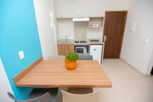A cozinha ou cozinha compacta de Ilhas do Lago Eco Resort by WAM Experience