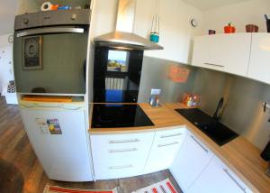 Una cocina o zona de cocina en Grand Studio Vue Mer