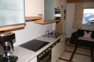 Kuchyň nebo kuchyňský kout v ubytování Ferienwohnung am Winterhaus