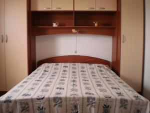 Postel nebo postele na pokoji v ubytování APARTMANI SENKA - VILLA OLIVER
