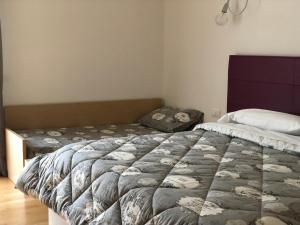Postel nebo postele na pokoji v ubytování Hotel Pramaggiore