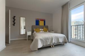 Posteľ alebo postele v izbe v ubytovaní Apple Green Apartments