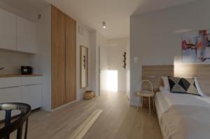 Posteľ alebo postele v izbe v ubytovaní Apple Green Apartments