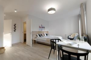 Posteľ alebo postele v izbe v ubytovaní Apple Green Apartments