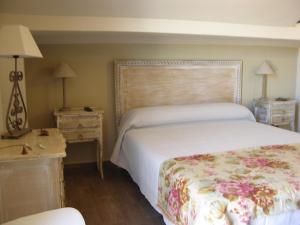 A bed or beds in a room at Albus Albi