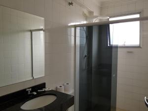 Koupelna v ubytování Astro Hotel