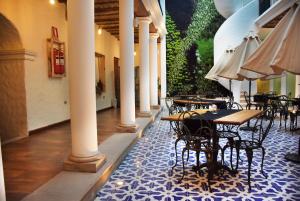 Un restaurante o sitio para comer en On Hotel Boutique