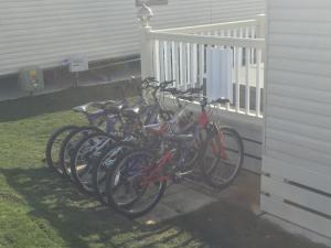 a row of bikes parked next to a building at tattershall lakes in Tattershall