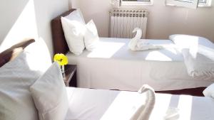 Postel nebo postele na pokoji v ubytování Apartment VILLA MERCI