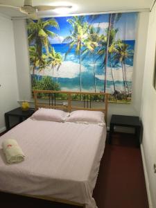 A bed or beds in a room at Ocean View Apartments