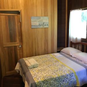 Voodi või voodid majutusasutuse Hilamito Lodge toas