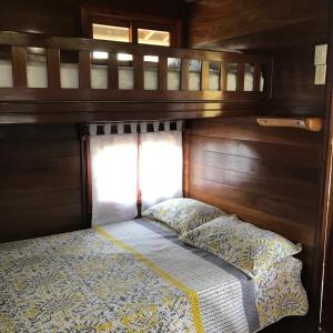 Voodi või voodid majutusasutuse Hilamito Lodge toas