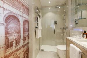 Ένα μπάνιο στο Boutiquehotel Das Tyrol
