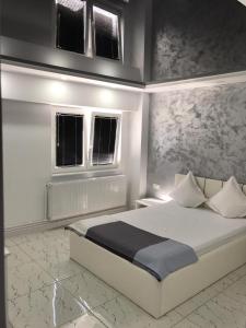Krevet ili kreveti u jedinici u objektu Archi's Apartament