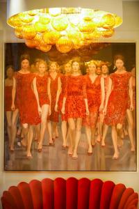 a painting of a group of girls posing for a picture at Boutiquehotel Das Tyrol in Vienna