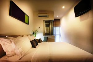Katil atau katil-katil dalam bilik di O'Boutique Suites Hotel @ Bandar Utama