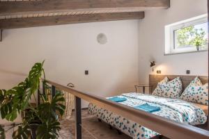 Postel nebo postele na pokoji v ubytování Apartmány Pod Lesem II