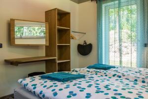 Postel nebo postele na pokoji v ubytování Apartmány Pod Lesem II