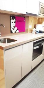 A kitchen or kitchenette at Malaka