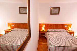 Posteľ alebo postele v izbe v ubytovaní Casa Enpiera II - Turistrat