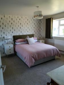Postel nebo postele na pokoji v ubytování Goshens Farm B&B