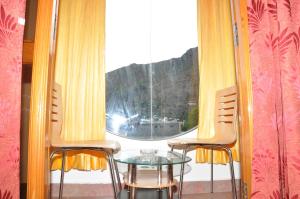 Nespecifikovaný výhled na hory nebo výhled na hory při pohledu z hotelu