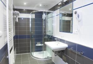 Kúpeľňa v ubytovaní Lázeňský Hotel Sadový Pramen