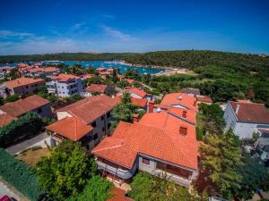 an aerial view of a town with orange roofs at Beautiful-Banjole-Beachside-Apartment-A1-150m-from-the-beach in Banjole