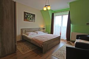Posteľ alebo postele v izbe v ubytovaní Na Wierchu