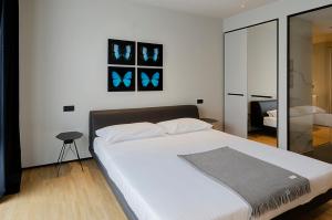 Postel nebo postele na pokoji v ubytování Piranesi 246