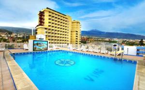 a large swimming pool on the roof of a hotel at Skyview Hotel Tenerife in Puerto de la Cruz