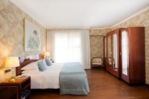 Postel nebo postele na pokoji v ubytování Starhotels Du Parc