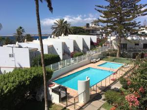 O vedere a piscinei de la sau din apropiere de Ocean view apartment Agustino Beach
