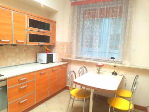 Cuisine ou kitchenette dans l'établissement Apartament Warszawska Centrum