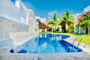 Bazén v ubytování Dolce Vita Caribe Villas nebo v jeho okolí