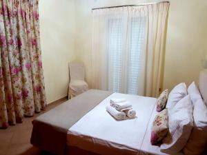 Posteľ alebo postele v izbe v ubytovaní Sime Villa Private Beach