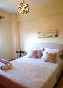 Posteľ alebo postele v izbe v ubytovaní Sime Villa Private Beach